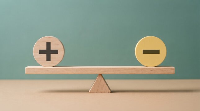 Wooden scale balances a plus sign against a minus sign to show the concept of weighing pros and cons.