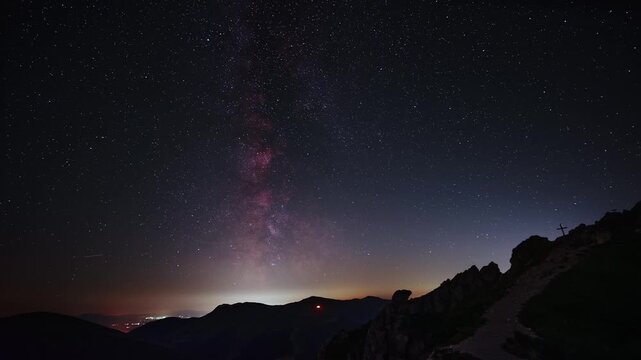 Night Sky Timelapse of Milky Way Galaxy and Perseid Meteor Shower over Mountain Ridge