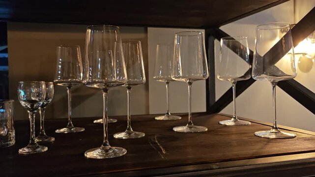 Row of elegant champagne flutes arranged on dark table for celebration, luxury drink service, festive event setup, upscale party atmosphere, sophisticated toasting