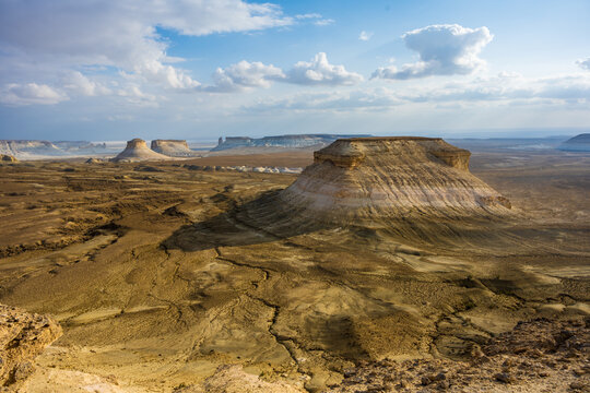 Desert landscape with mesas in Qaraqiya District