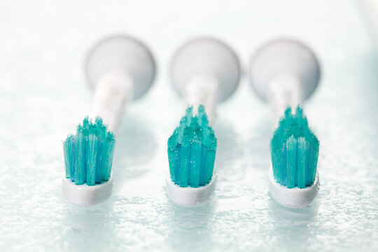 Electric toothbrushes on white background, close up