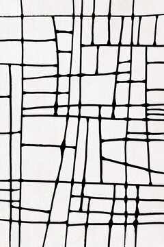 Black irregular grid forms an abstract pattern on white background