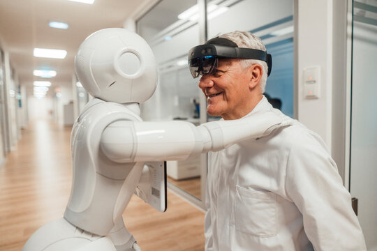 Scientist collaborates with humanoid robot using augmented reality in lab