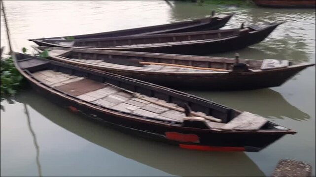 Traditional Wooden Boats on Peaceful Riverbank &ndash; 4K