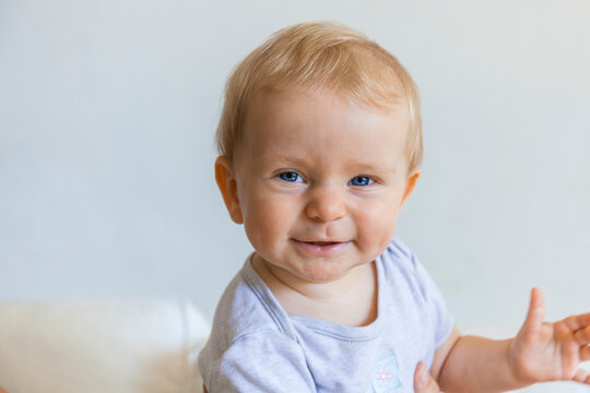 Portrait of happy blond baby girl 