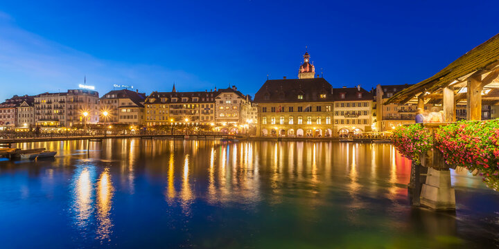 Switzerland, Canton of Lucerne, Lucerne, Old town, Reuss river, City view, Chapel bridge in the evening