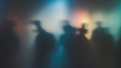 Fototapeta premium Silhouetted Figures in a Misty Environment with Colorful Lighting