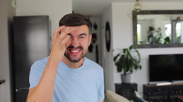 A 40 year old man showing crow feet and forehead wrinkles