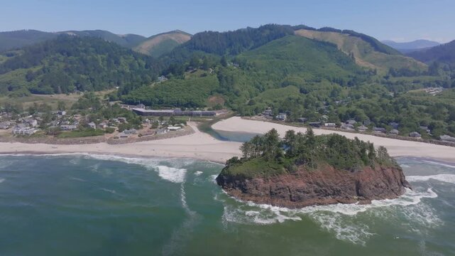 Aerial view of Proposal Rock and sandy beach along the coastline in Oregon City, Oregon, United States.