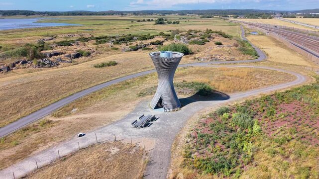 Aerial view of the Naturum Getteron bird watching tower, a unique wooden structure set in the coastal landscape of Varberg, Hallands lan, Sweden.