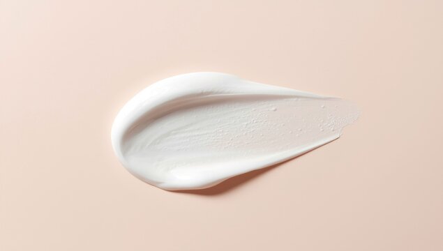 Creamy Skincare Product Swatch on Soft Beige Background