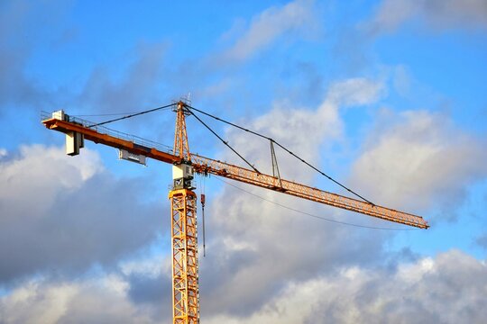  Construction sites against a backdrop of clouds.