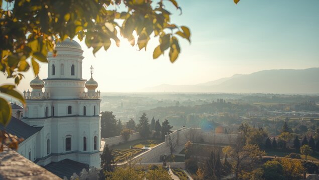 Historic Church Steeple Overlooking a Scenic Valley at Sunrise