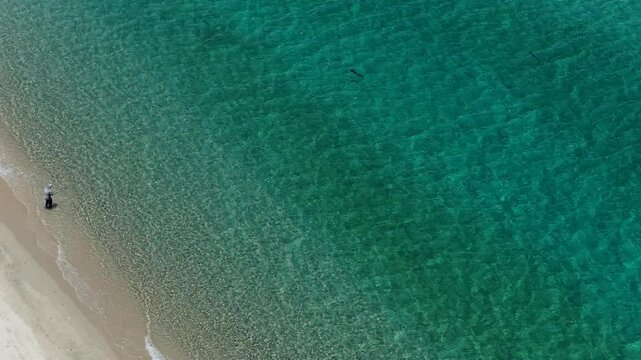Aerial view of a fly fisherman on the beach in La Ventana, Baja California Sur, Mexico.