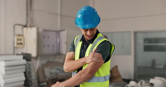 Construction, shoulder pain or man on site with massage, arm issue or injury in building project. Accident, hurt or engineer with discomfort, muscle strain or arthritis in infrastructure development.
