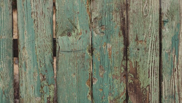 Aged Teal Wooden Planks with Rustic Texture and Peeling Paint