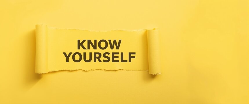 Torn Yellow Paper with Know Yourself Text on Bright Yellow Background