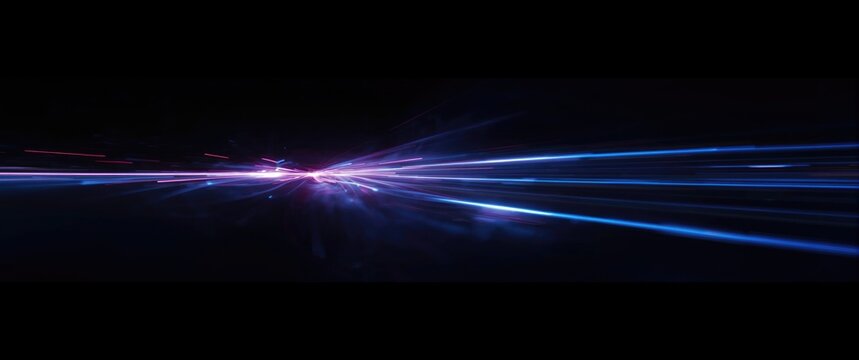 Abstract Light Trails in Blue and Purple on Black Background