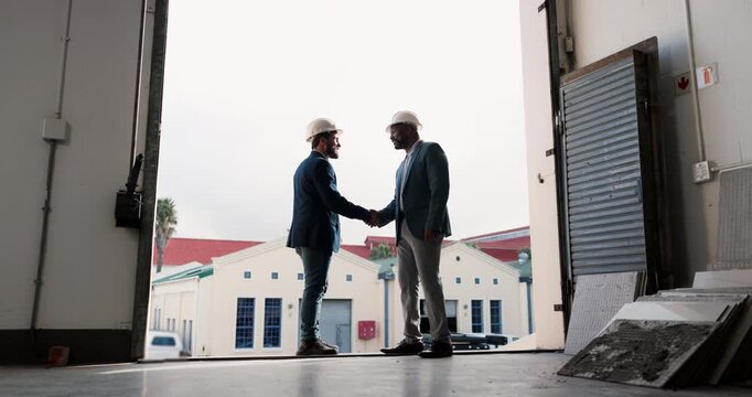 Construction, handshake and men with safety inspection, building deal and approval in site check. Industrial, partnership and engineer with shaking hands, agreement and clearance in compliance review