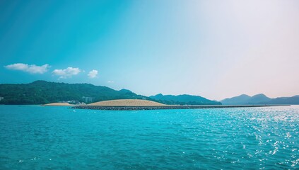 Naklejka premium Tropical Seascape with Idyllic Islands and Clear Blue Waters Under Bright Sky