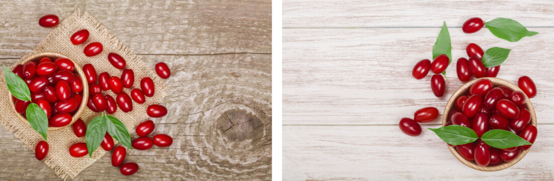 dogwood berry with leaf in bowl on old wooden background with copy space for your text. Top view