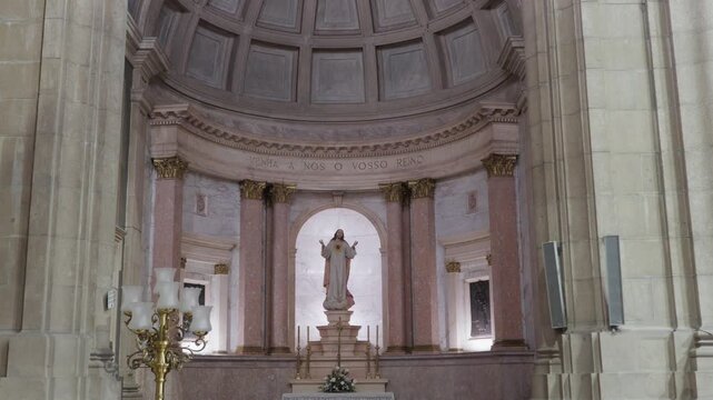 Marble Altar And Sacred Heart Statue Beneath A Coffered Dome In A Church In Portugal