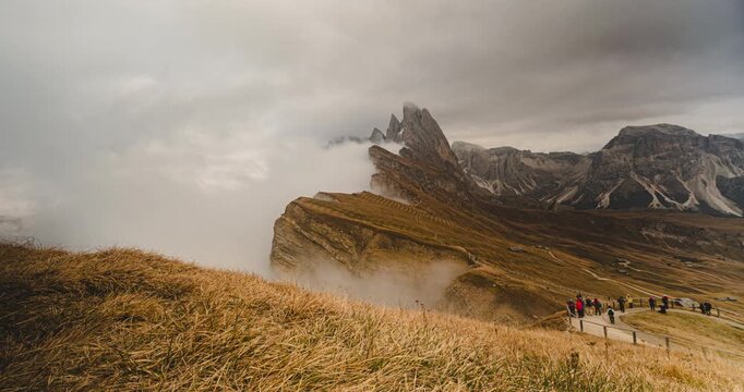 4K Timelapse Scenic landscape view of the Dolomites Alps featuring the Odle mountain range and Seceda peak in Italy. Captures dramatic alpine scenery 
