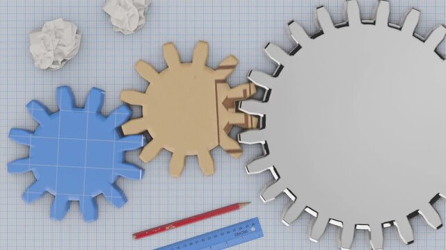 Gears and drafting tools on graph paper symbolizing engineering and innovation