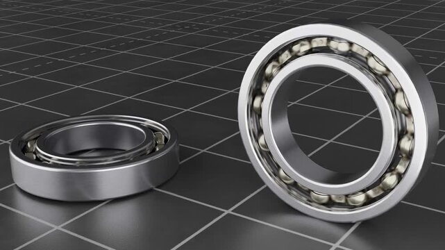 Close-up view of precision ball bearings on a grid surface