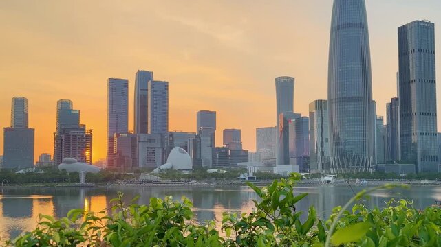 SHENZHEN, CHINA &ndash; AUGUST , 2026: Modern skyscrapers and city streets in the background at sunset in Shenzhen, China.