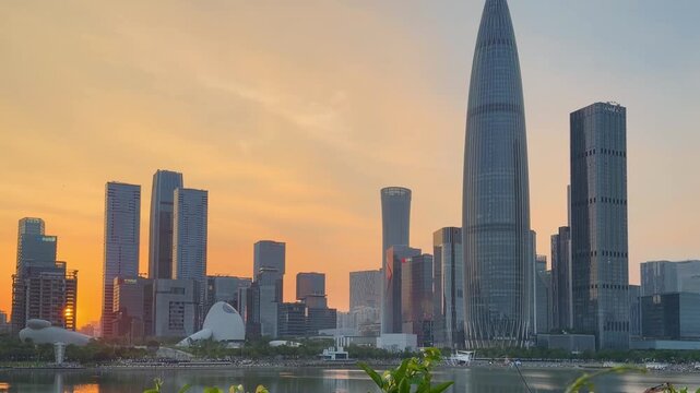 SHENZHEN, CHINA &ndash; AUGUST , 2026: Modern skyscrapers and city streets in the background at sunset in Shenzhen, China.