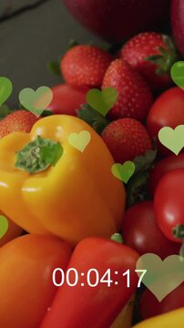 Animation of heart icons over fruit and vegetables