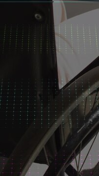 Animation of neon heart rate over midsection of caucasian woman on wheelchair