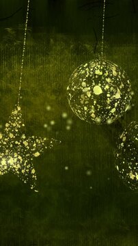 Animation of dots, stars and golden baubles on black and gold background