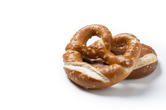 Traditional soft pretzel isolated on white background. Copy space