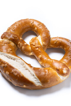 Traditional soft pretzel isolated on white background