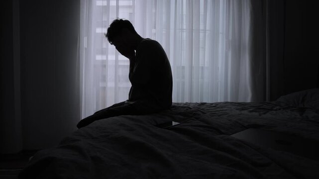 Emotionally drained digital nomad alone in rented apartment struggling with homesickness burnout and loneliness after constant moving and travel