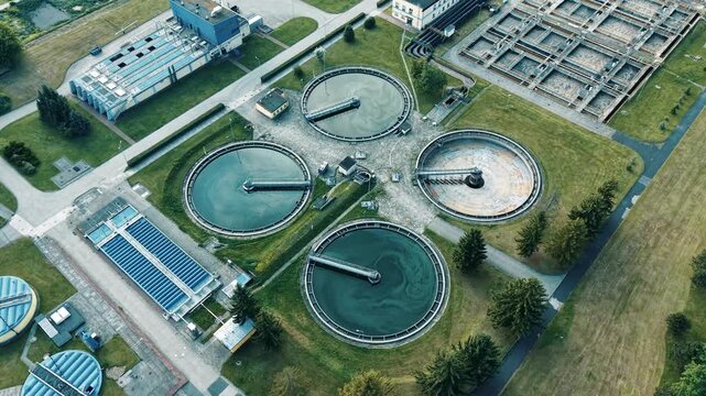 Industrial wastewater treatment plant captured in summer from above