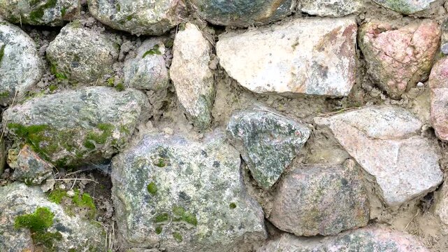 stones are arranged in a chaotic order and are a texture