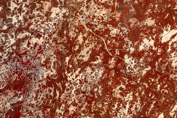 Naklejka premium Luxury red breccia marble texture with white veining, Rosso Levanto stone background close-up
