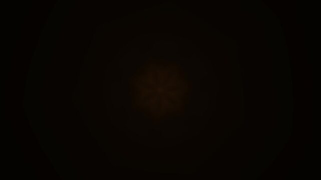 Glowing Amber Particle Swirl Background An amber particle swirl in a consistent motion on a black background. It serves as a visual tool for live events, clubs, and LED displays