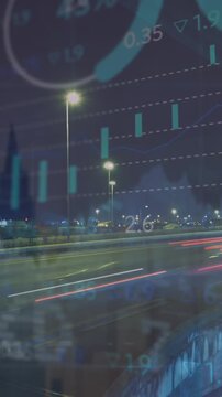 Animation of stock market data processing over night city traffic against aerial view of cityscape