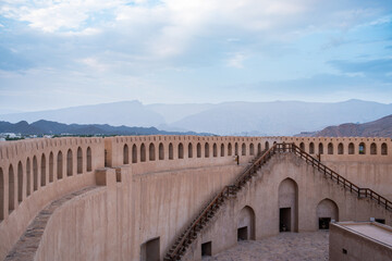 Fototapeta premium Traditional courtyard and defensive walls inside historic Nizwa Fort in Oman