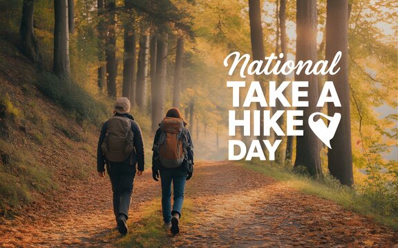Hikers exploring a scenic forest trail in autumn for national take a hike day event