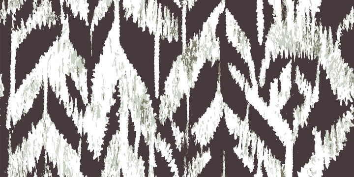 Abstract ikat pattern in white and brown with a textured tribal feel for textile design