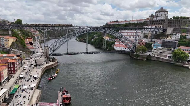 Porto cityscape and Douro river with Dom Lu&iacute;s i bridge urban life and tourism in Portugal aerial view travel Europe architecture drone