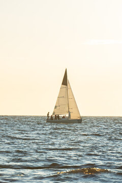 White sailing yacht boat luxury cruise on blue sea water at sunny day.
