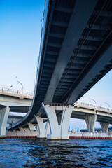 Fototapeta premium Modern concrete highway bridge overpass highway infrastructure transport architecture view. 