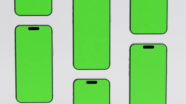 Multiple Smartphones Green Screen Mockup on White