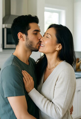 Obraz premium Intergenerational love and family connection, diverse couple kissing in a modern home kitchen, happy relationship and affection